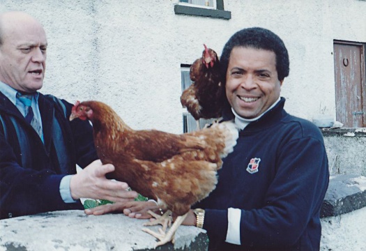 Garry with the author and his pet chickens