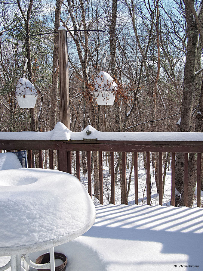 snow on porch table