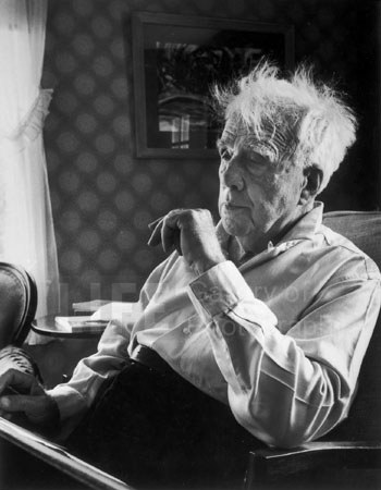 We own a signed print of this portrait of Robert Frost. It hangs downstairs in the den.