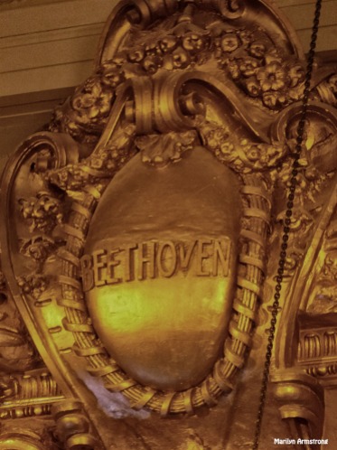 Way up by the ceiling, Beethoven's name is engraved. A tribute to the composer from the architect. I can't see it except through my very long lens. Most people don't know it's there at all.