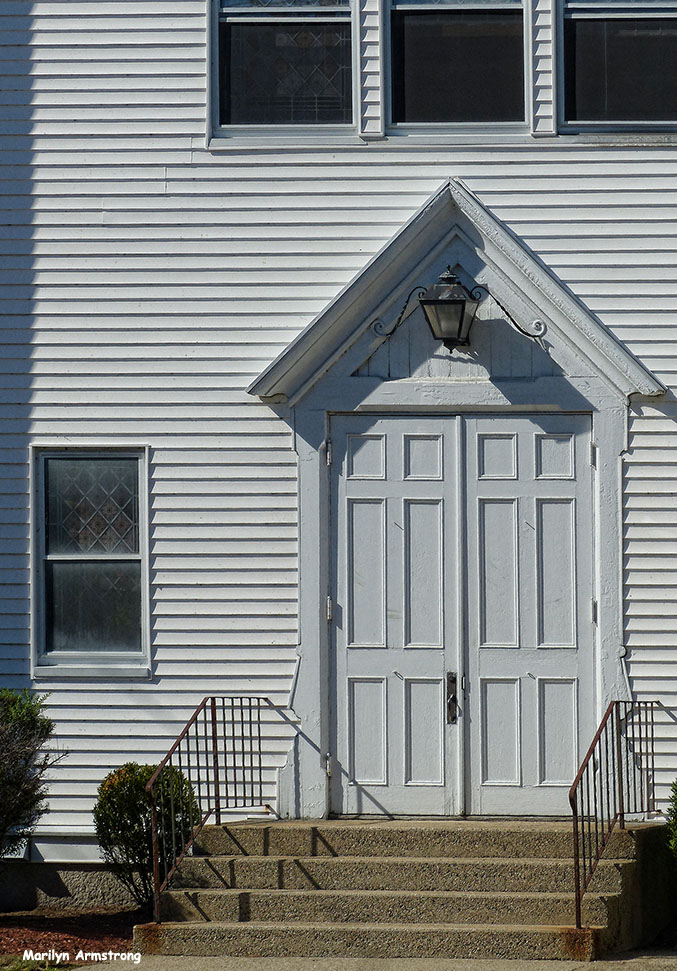 The door of the Baptist Church on the north end of town.