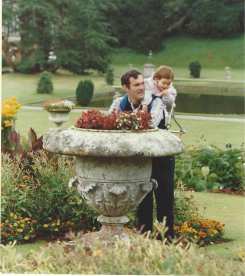Larry and Sarah in a formal garden in Wales, 1986